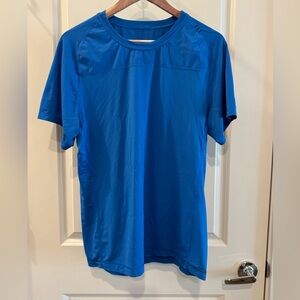 Lululemon Athletica Vibrant Blue Activewear Shirt.